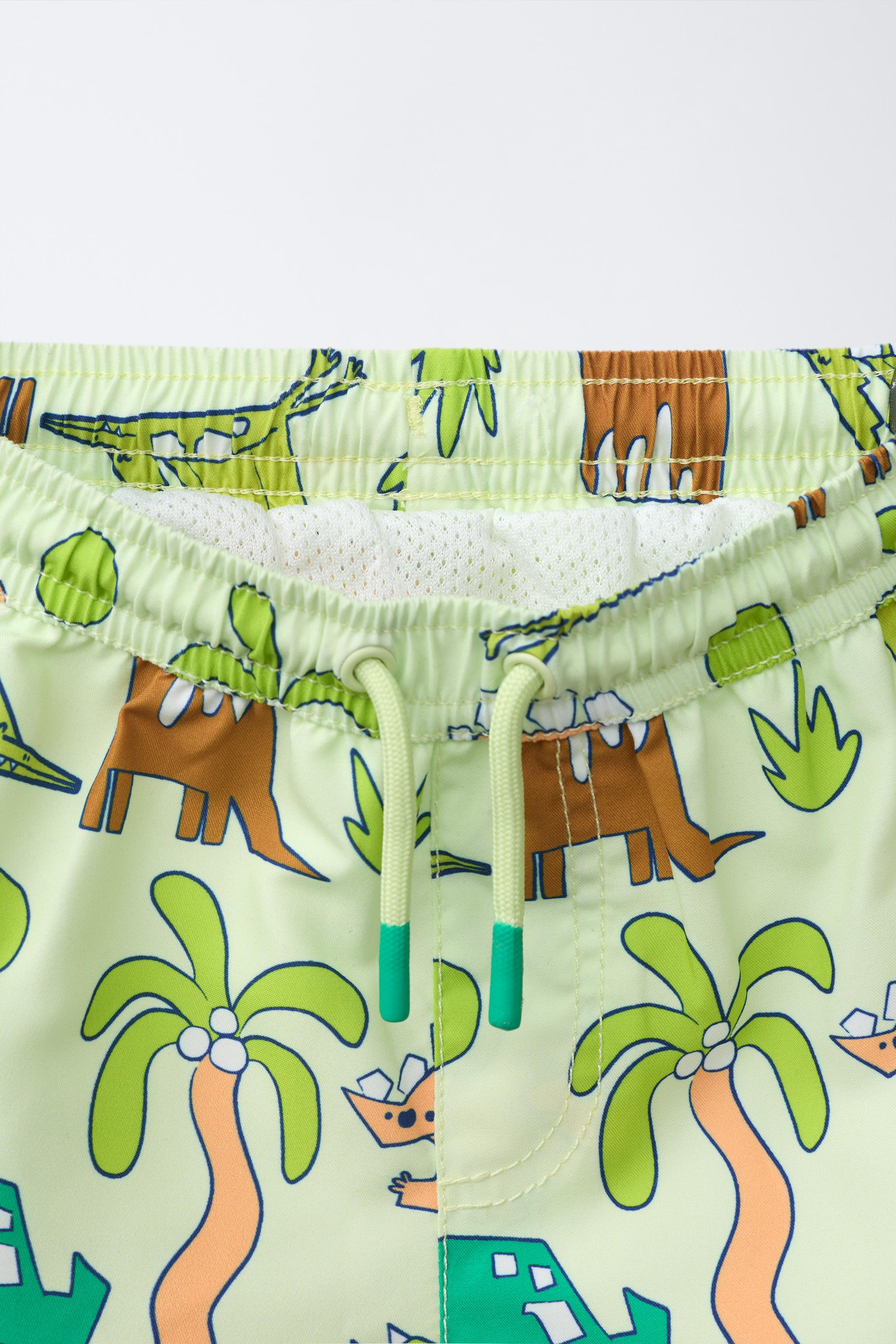 1-6 YEARS/ DINOSAUR SWIM SHORTS